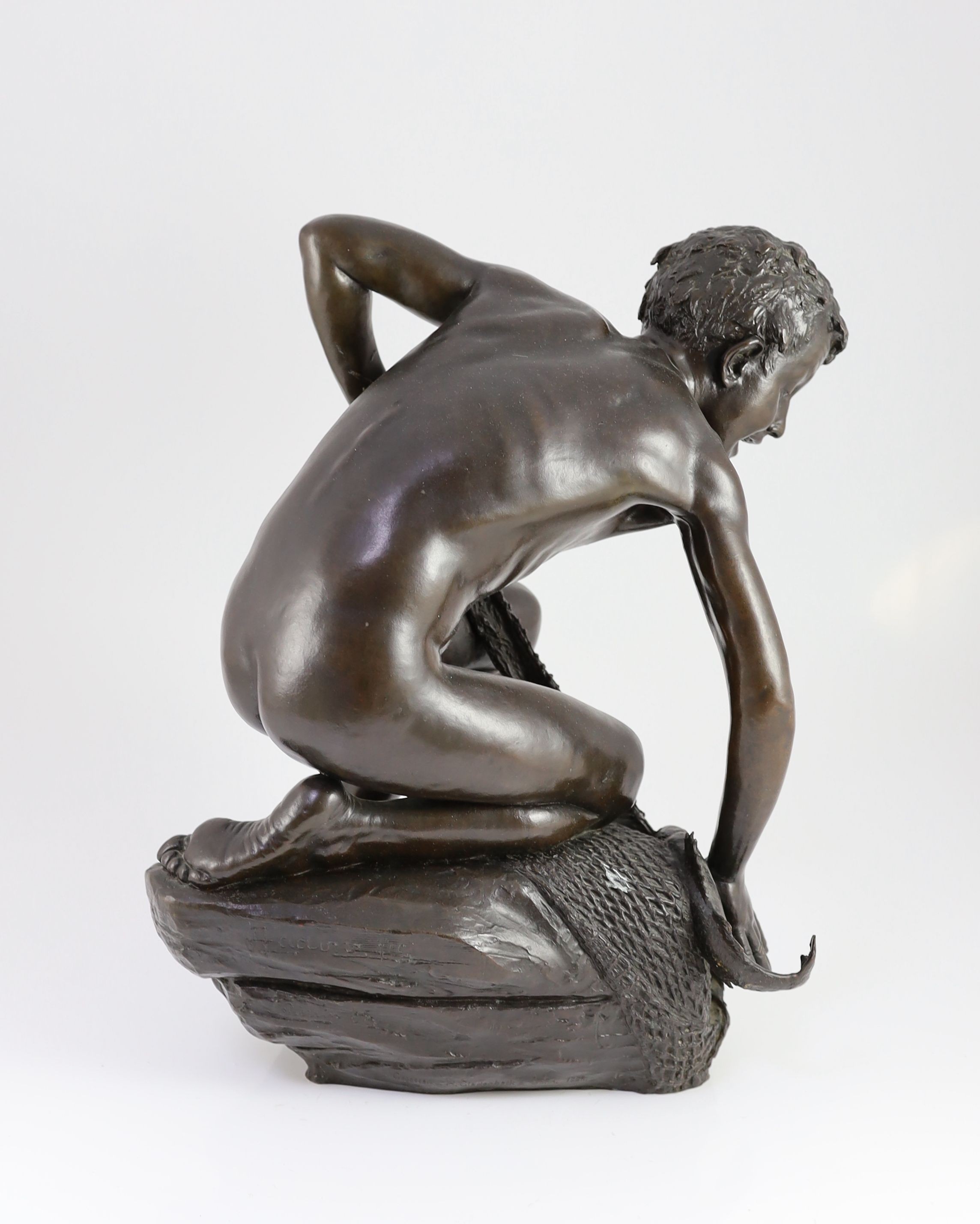 H. Gladenbeck and Son. A bronze figure of a boy catching a fish, height 45cm
